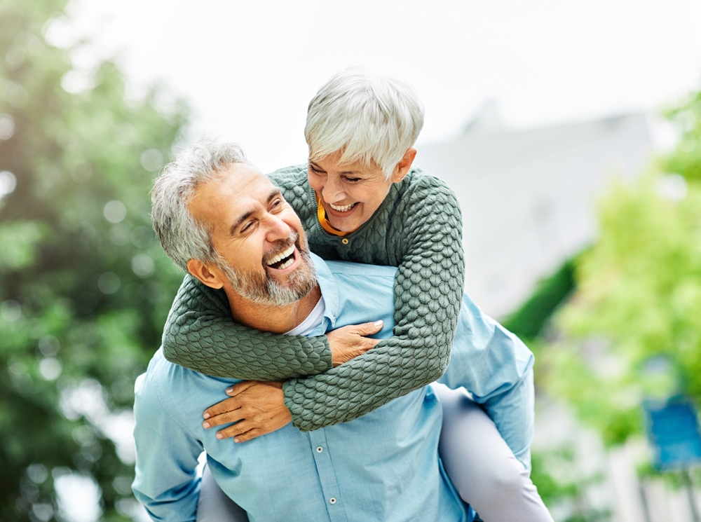 Happy active senior couple outdoors.